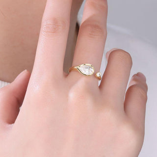 Stellar Drift · Pear Cut Moissanite Statement Ring