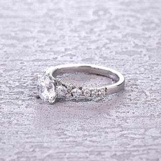 Floral Radiance • Round Cut Moissanite Engagement Ring