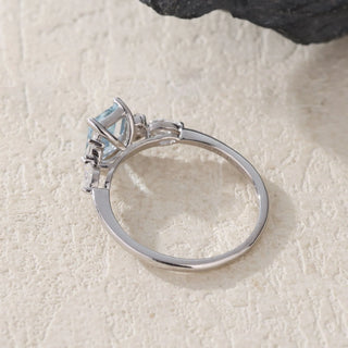 Azure Serenity · Emerald Cut Aquamarine Engagement Ring